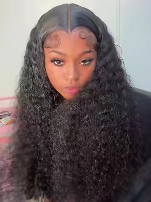 TikTok post by @syddesciencekid for Tahikie Hair Shop. Caption reads: I guarantee this is the best burmese curly wig. 😫....