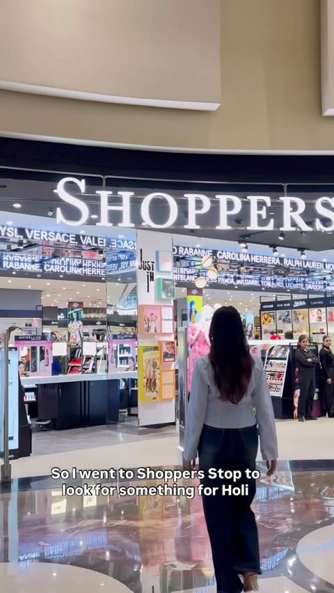 Instagram post by @_.aditiii_4 for Shoppers Stop. Caption reads: Exploring the Holi collection at Shoppers Stop 🌸....