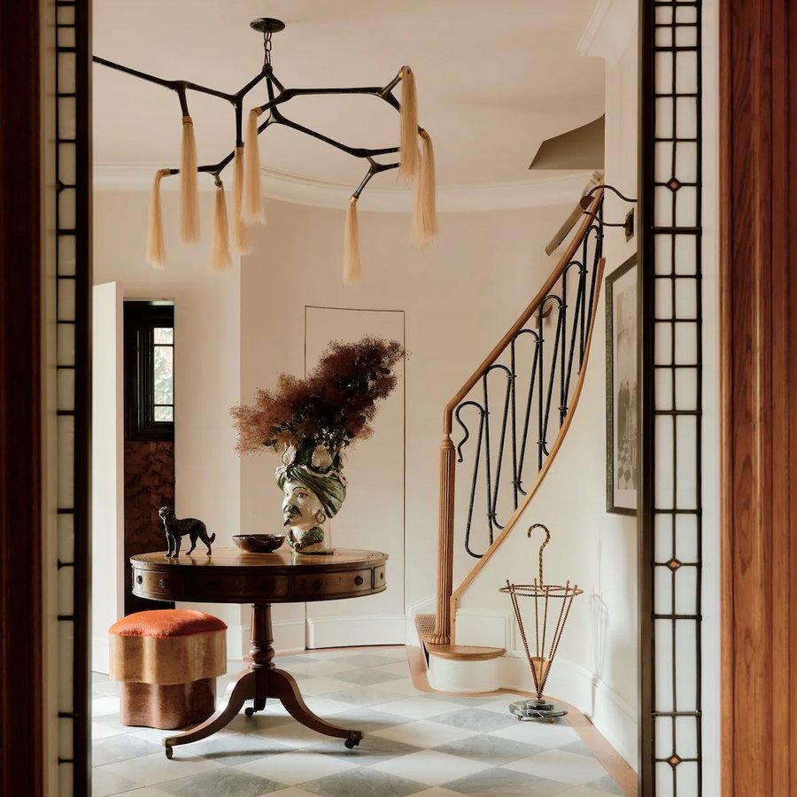 Instagram post by @michellerago for Architectural Digest. Caption reads: | AD | This home is a confluence of many things....