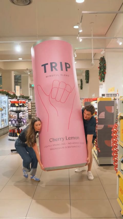 Instagram post by @olivia.ferdi for Whole Foods Market. Caption reads: Take a TRIP to Whole Foods Market 🫶 Meet new and....