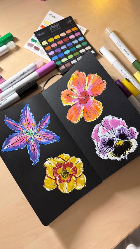 Instagram post by @uchmanowicz.art for Ohuhu Art Supplies. Caption reads: Your reminder to try acrylic markers on black....