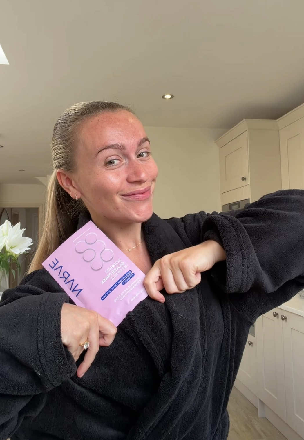 TikTok post by @tieggregory_ for Narae. Caption reads: Let’s try the @Narae UK mask together!! 🎀🩷🌷....