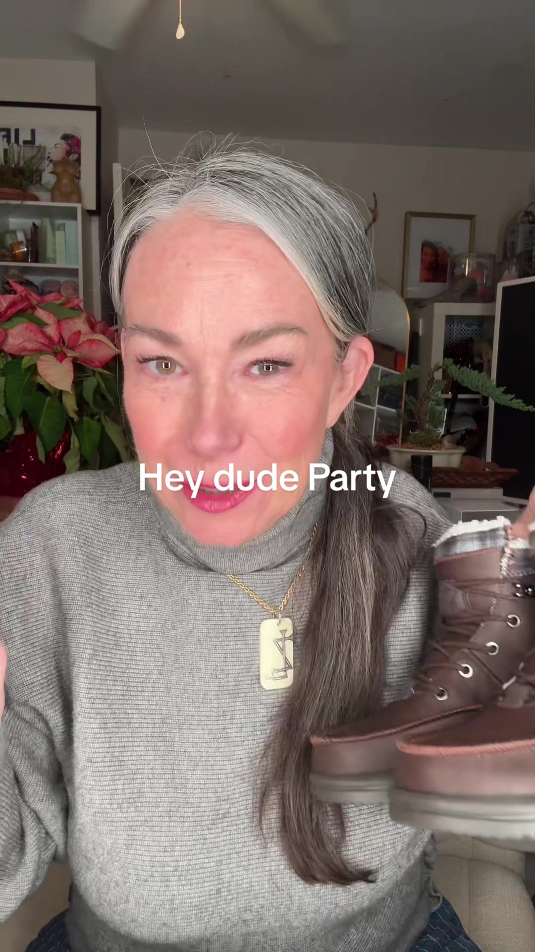 TikTok post by @aestheticaleestyled for HEYDUDE shoes. Caption reads: @HeyDude everyone’s getting them for the holidays ....