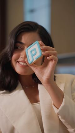 Instagram post by @rashmika_mandanna for HDFC Bank. Caption reads: You know how much I loveeee doing things that suit....
