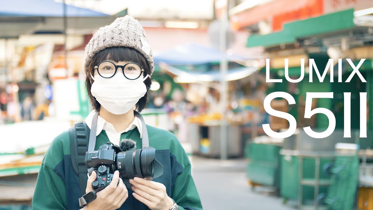YouTube post by @カメラのコムロ for Panasonic. Caption reads: First impressions of the LUMIX S5II, taken in Hong....