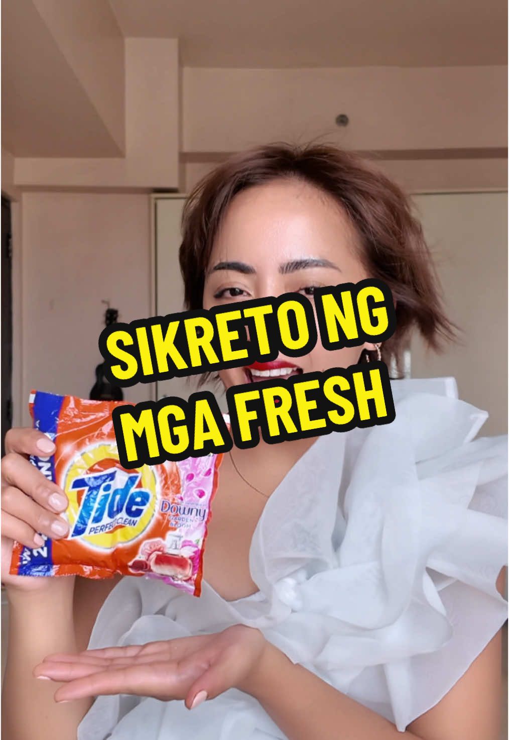 TikTok post by @ddonnacariaga for Tide. Caption reads: Alam niyo na ba ang sikreto ko sa pagiging fresh,....