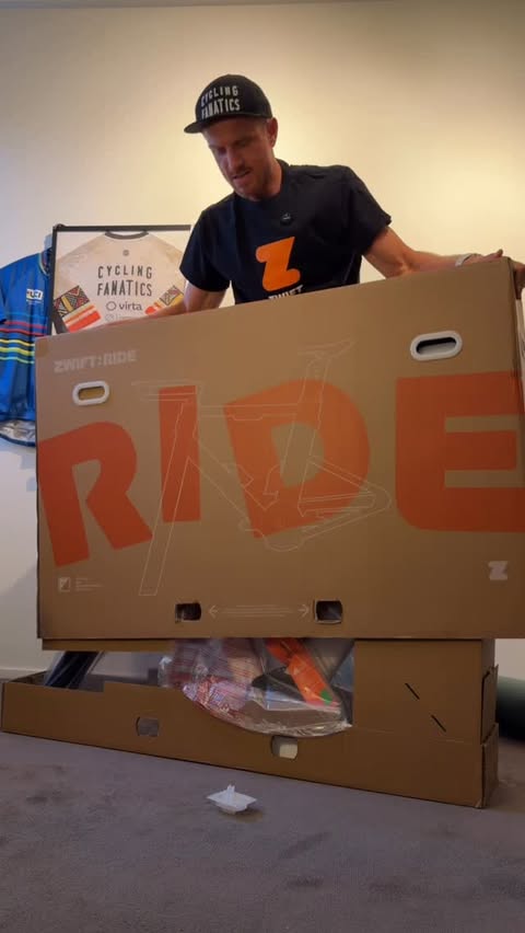 Instagram post by @jasperverkuijl for Zwift. Caption reads: FULL UNBOXING OF THE @gozwift RIDE! Question about....