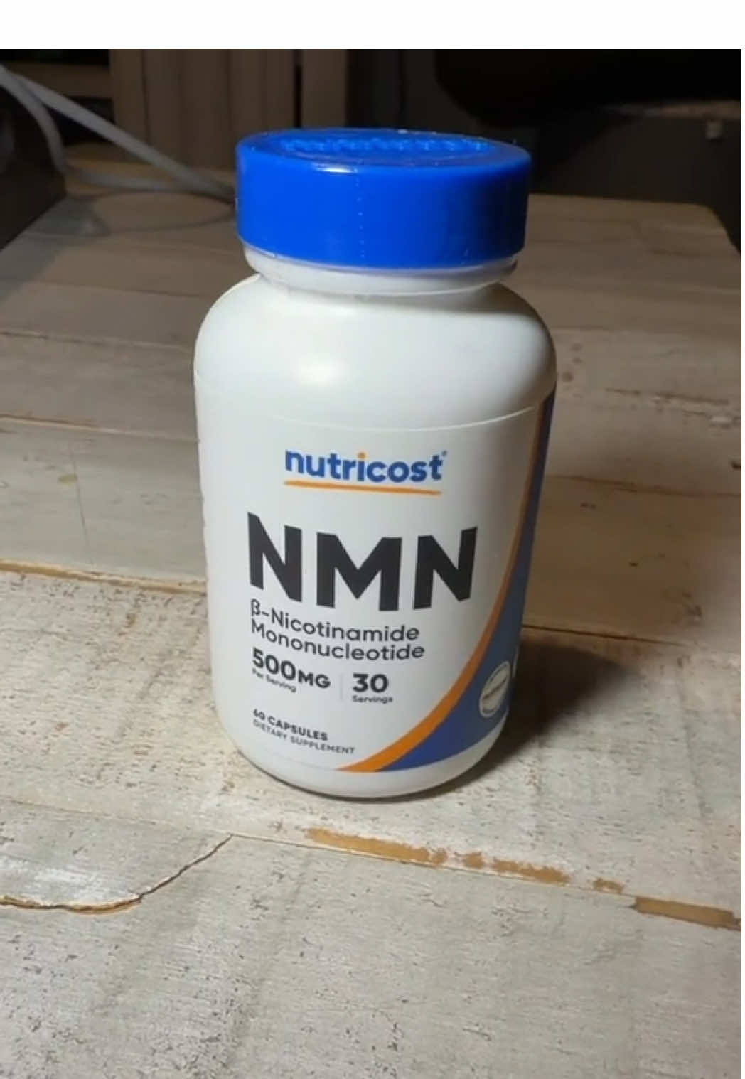 TikTok post by @trishbru for Nutricost. Caption reads: Viral Nutricost NMN supplement #TikTokShopPartner....