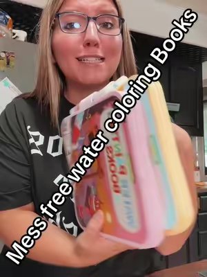 TikTok post by @_michellemomof2 for TIME X STORE. Caption reads: [...] #MessFreeWaterColoringBooks @TIME X STORE.