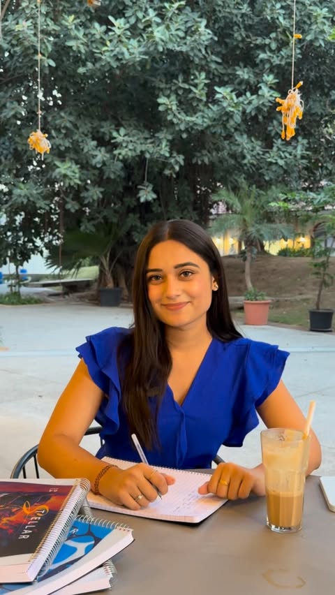 Instagram post by @shahnidhi.10 for Youva stationery. Caption reads: A notebook that shines brighter than my Monday....