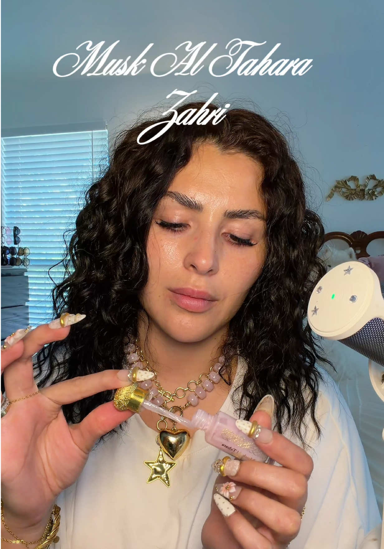 TikTok post by @maytexmyers for OudLash. Caption reads: [...] #asmrmouthsounds #bukhoor #musk @Oudlash.