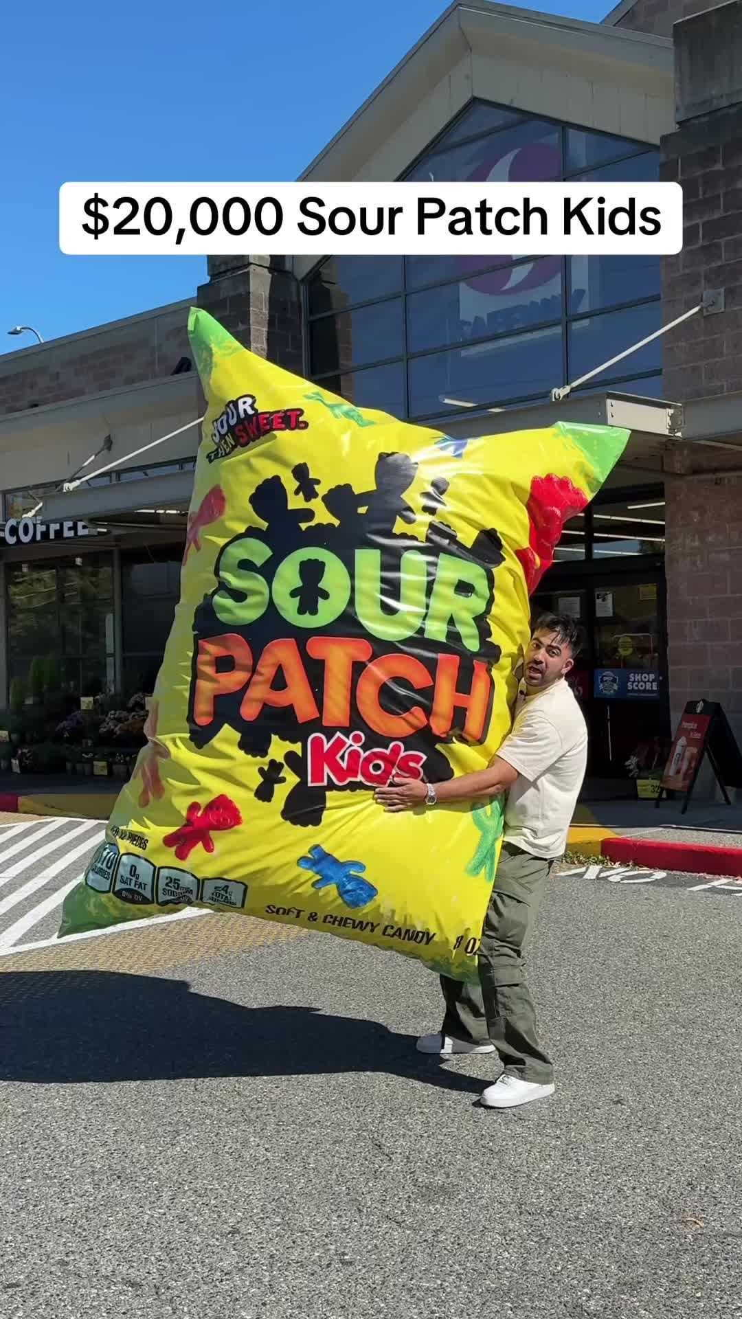 TikTok post by @aminshaykho for Sour Patch Kids. Caption reads: Making the world’s most expensive bag of Sour....
