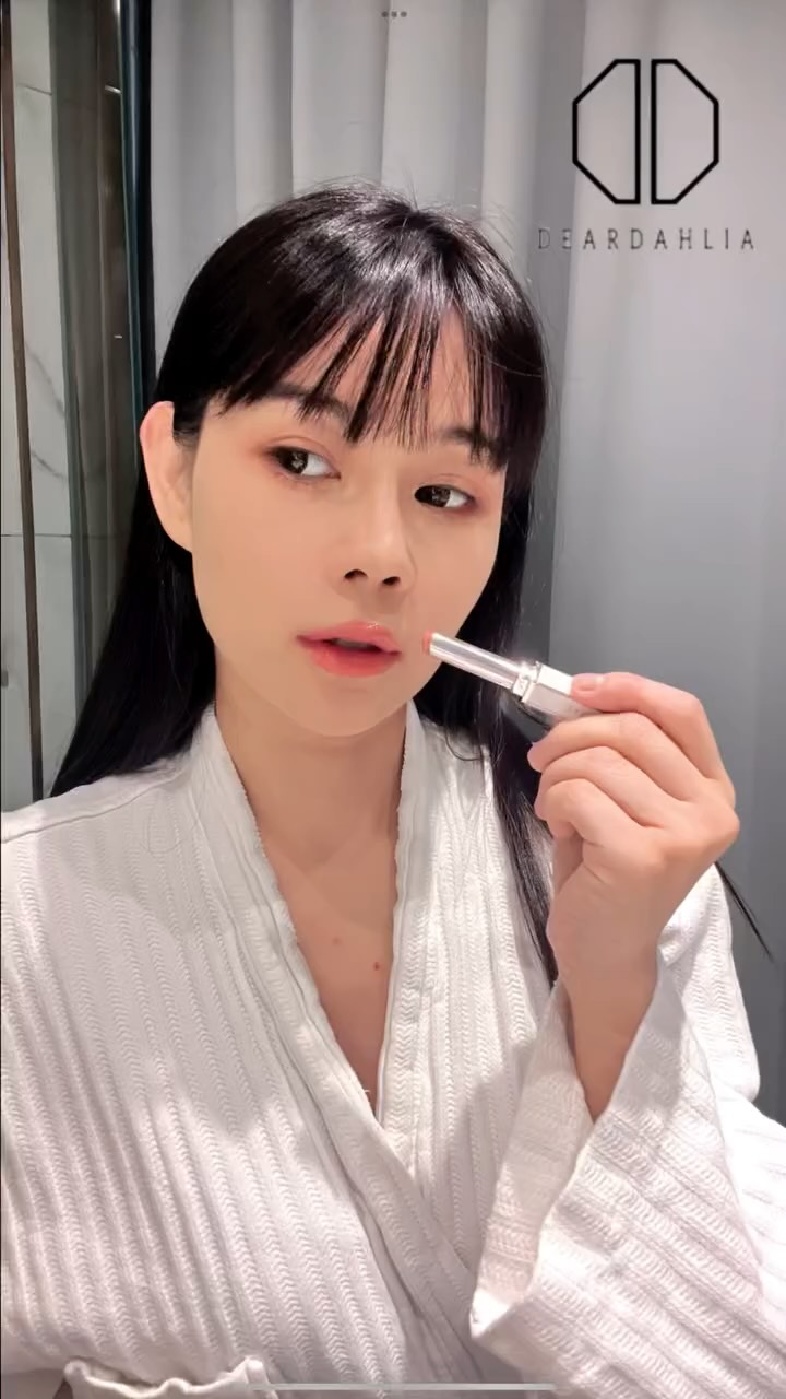 Instagram post by @inesimma31 for DearDahlia. Caption reads: Glossy lips, but make it vegan 🌸💄
I’ve been....