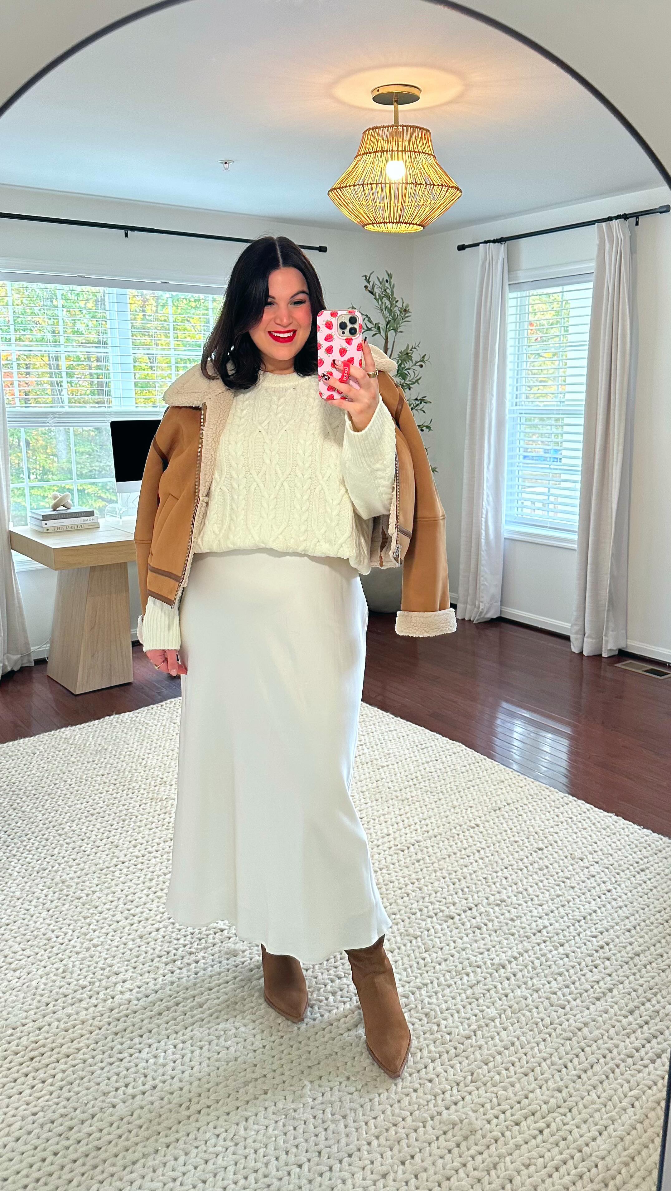 Instagram post by @kelly_elizabethxo for Thigh Society. Caption reads: Midsize holiday outfit with my @thighsociety....