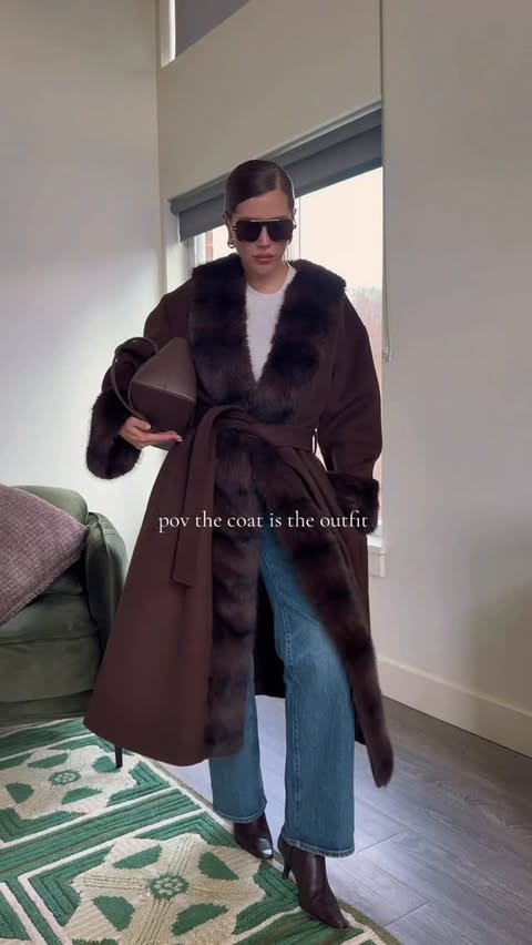 Instagram post by @imjamiestone for REVOLVE. Caption reads: A moment for this coat 😍😍 @revolve comment FIT &....