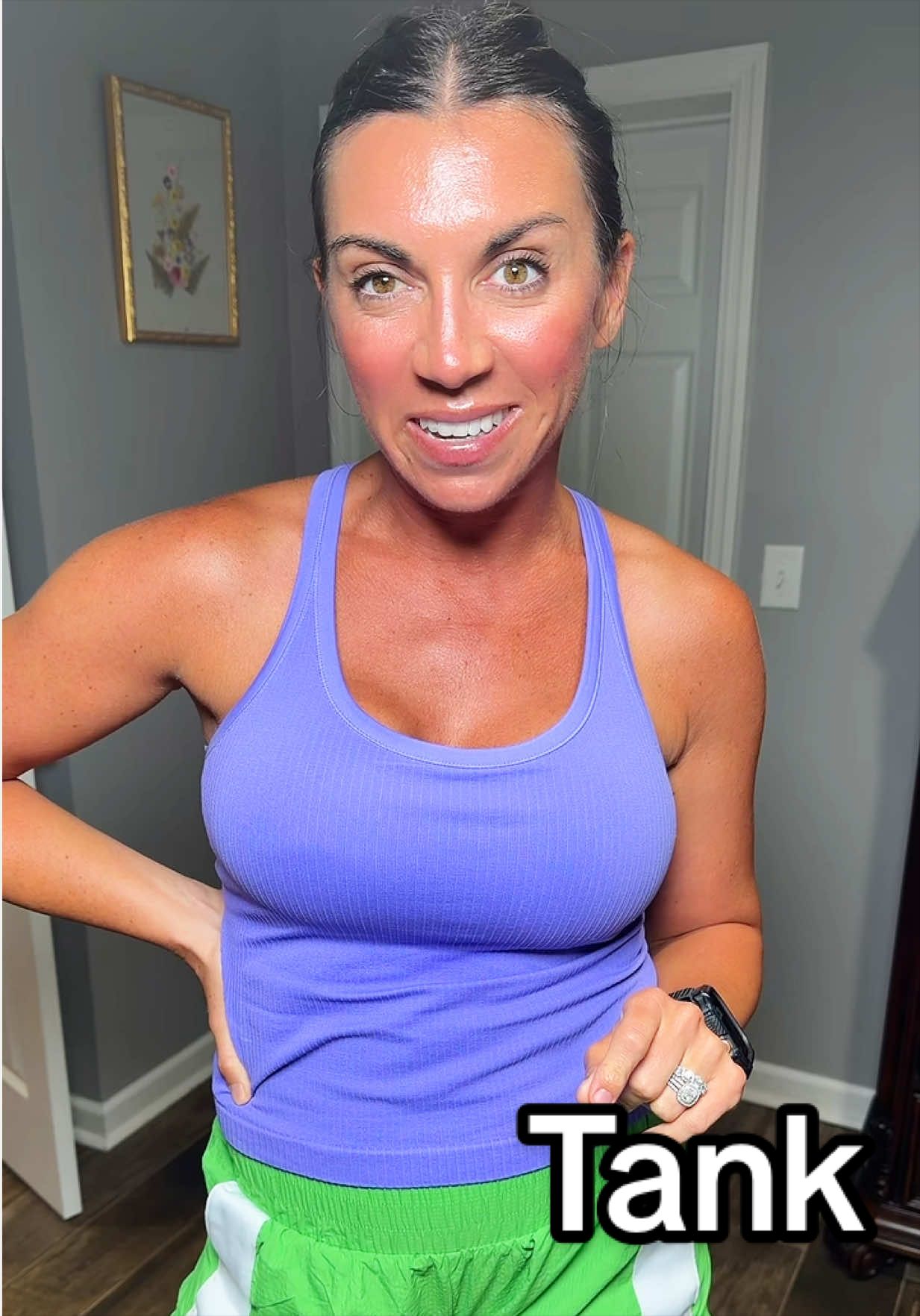TikTok post by @halle.crook for ATTRACO. Caption reads: [...] #tanktop #workouttank #athleisurewear....