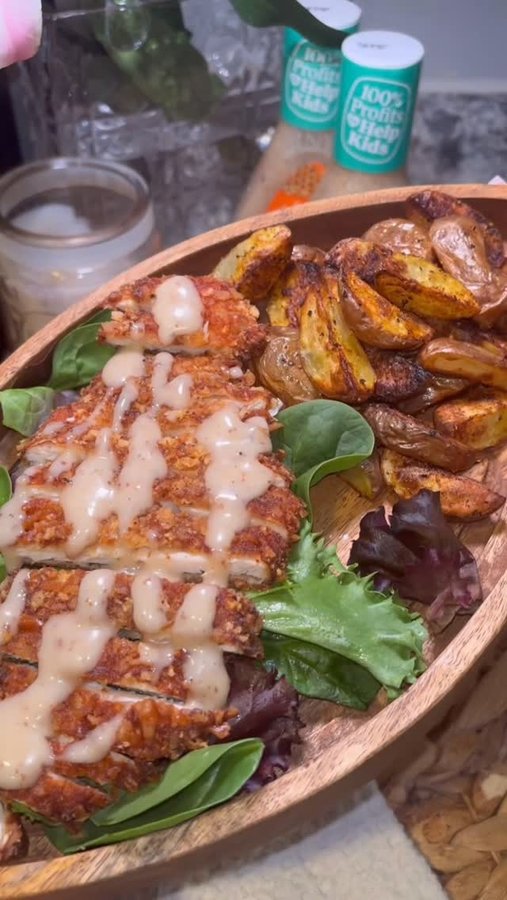 Instagram post by @tastewithnicki for Newman's Own. Caption reads: Pretzel Crusted Chicken Cutlet Recipe👇 

#AD....