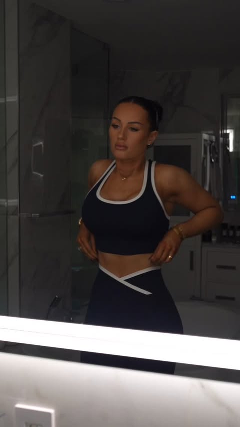 Instagram post by @jenniferdorie_ifbbpro for BOMBSHELL SPORTSWEAR. Caption reads: [...] make sure the fit was on point 🤍....