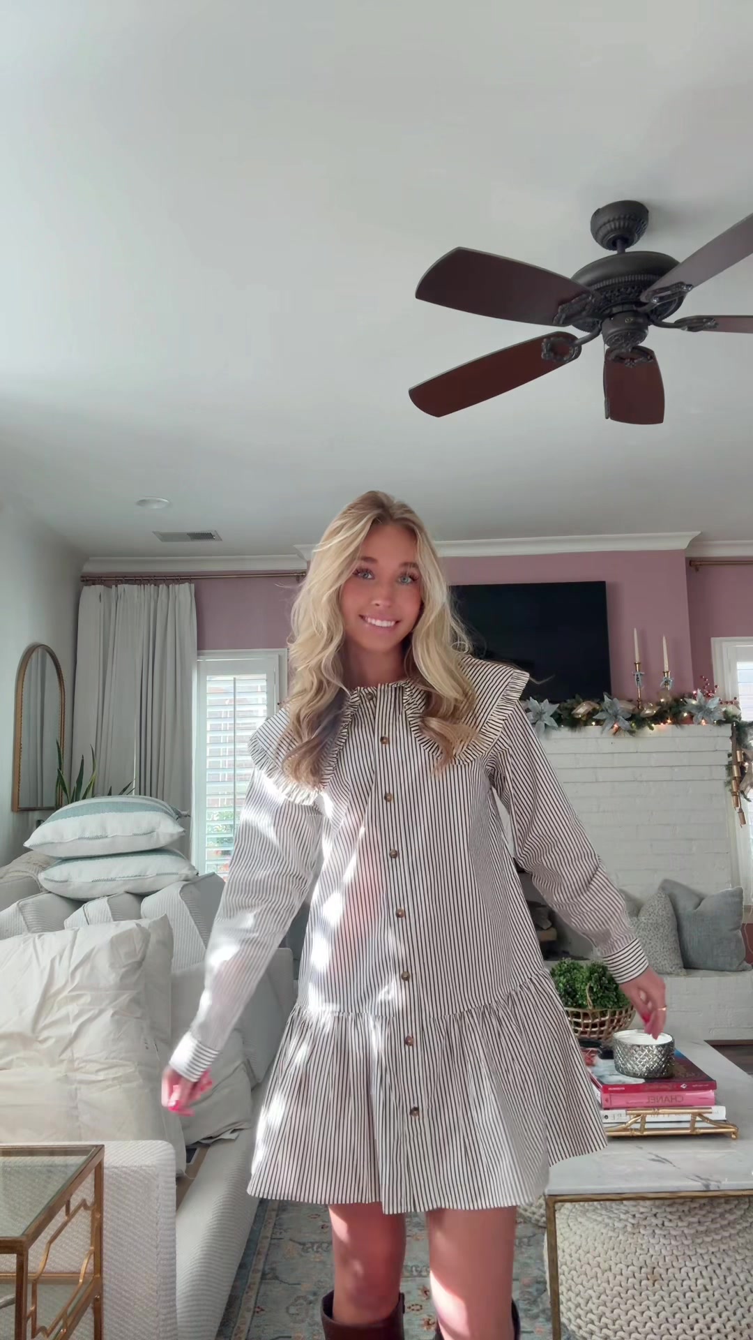 TikTok post by @kenhitch for Vestique. Caption reads: Don’t mind the couch😆🤎 #falloutfits @vestique .