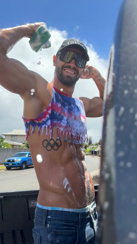 Instagram post by @swimmermichael for Toyota USA. Caption reads: [...] greatest Nation on Earth! #TeamToyota....