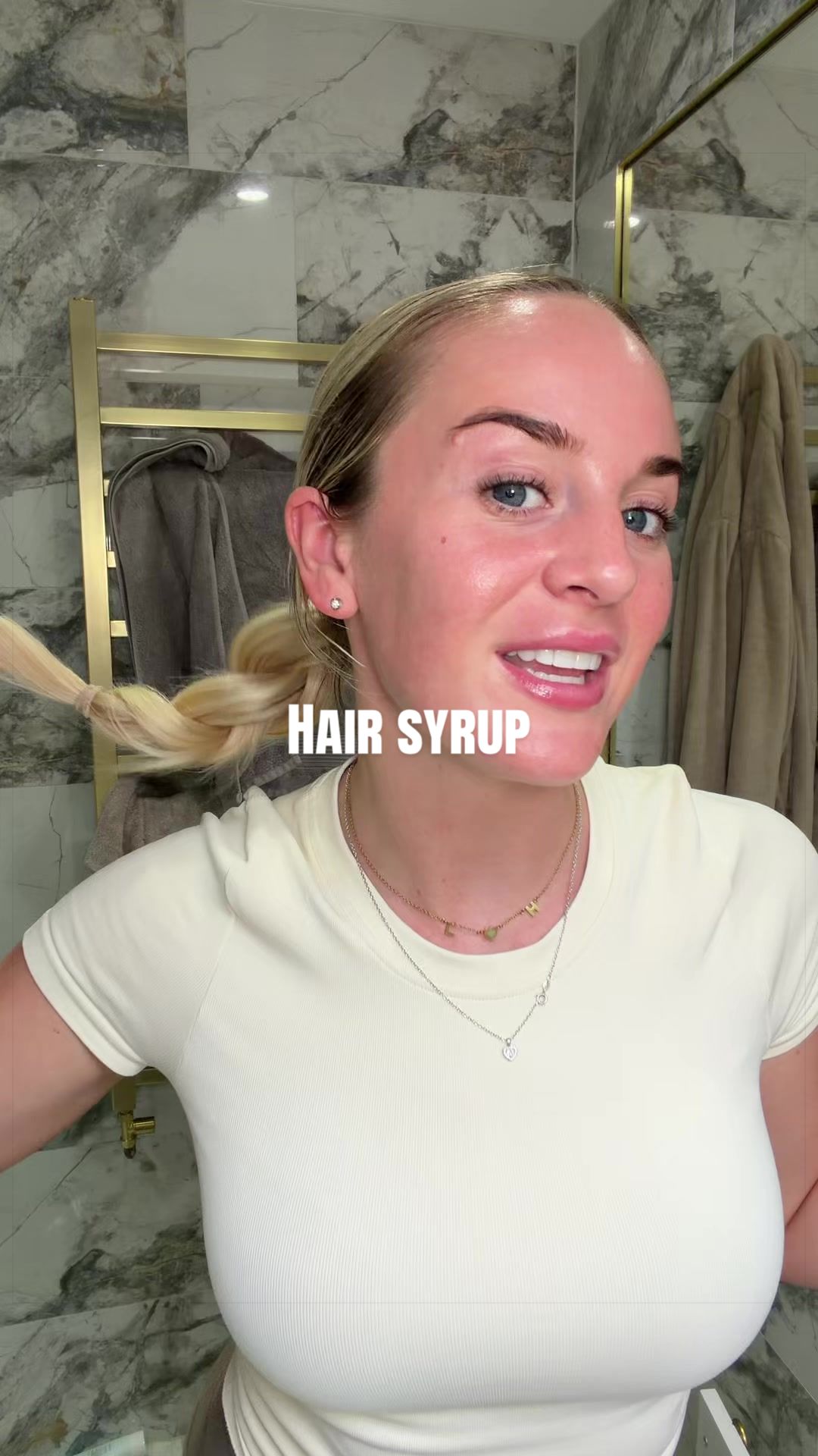 TikTok post by @georgiacoggings for Hair Syrup. Caption reads: hair syrup coming in clutch even for the extension....