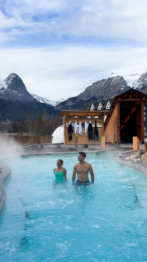 Instagram post by @samanthalreid for Travel Alberta. Caption reads: ✨ Alberta’s mountain magic has a new way to warm....