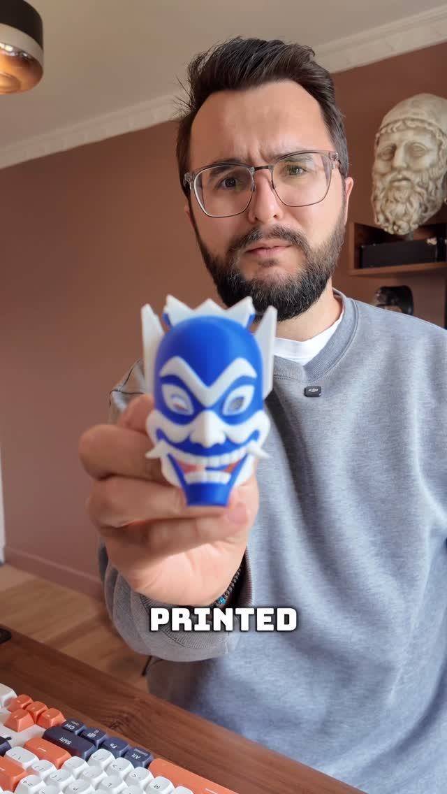 Instagram post by @kostagenaris for Bambu Lab. Caption reads: [...] content… but here we are.

This is the Bambu....