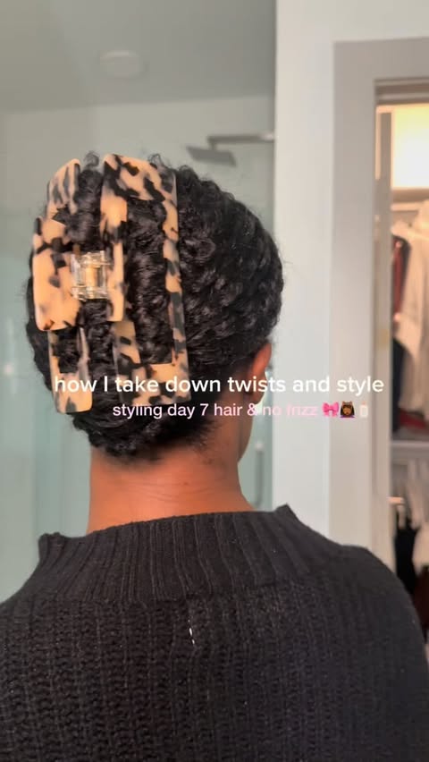 Instagram post by @deairalashante for RevAir • Reverse-Air Dryer. Caption reads: who else loves a good twist out with NO frizz ✨🎀....