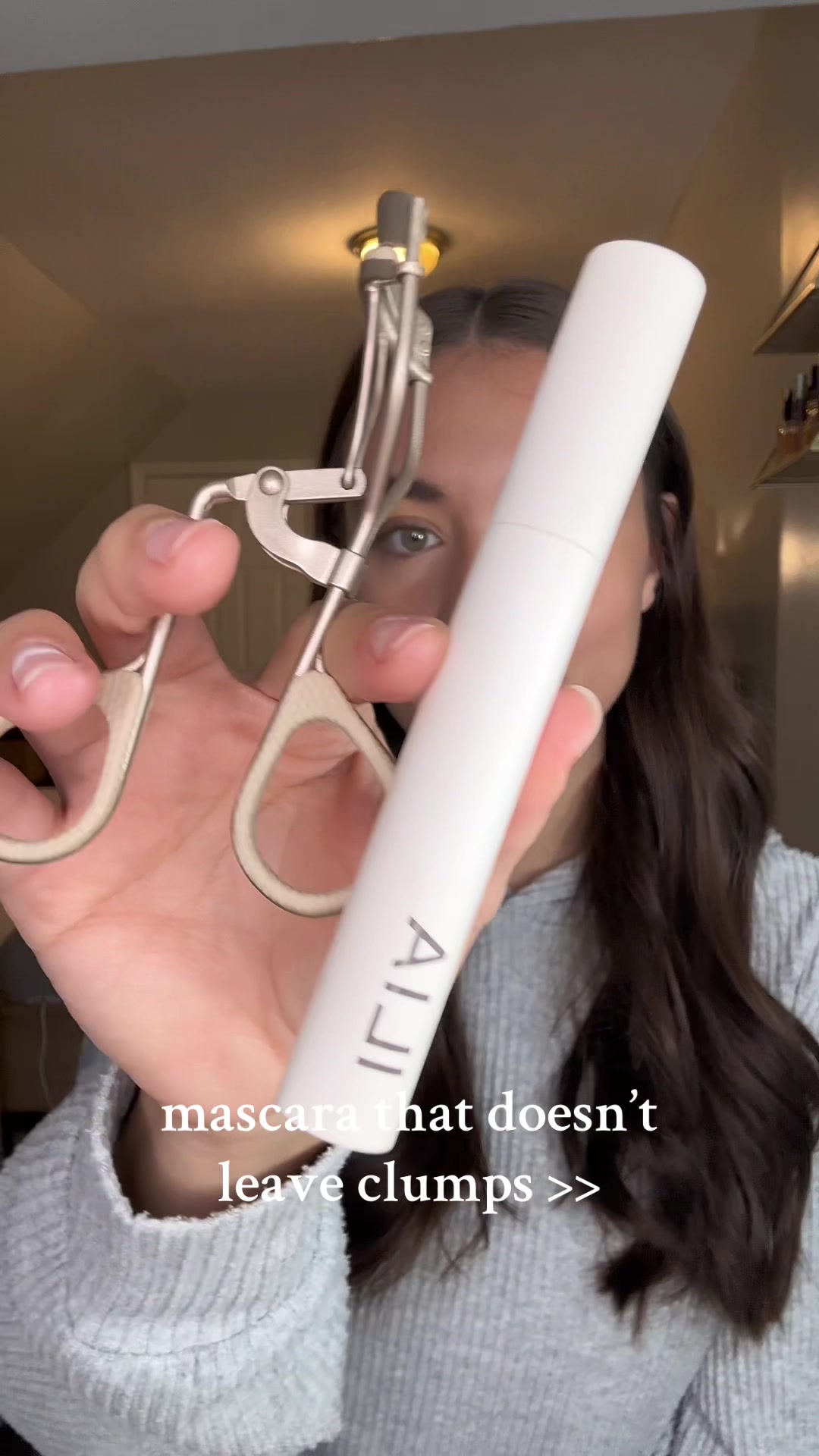 TikTok post by @bri.carney8 for ILIA Beauty. Caption reads: [...] brown mascara recently! @ILIA Beauty....