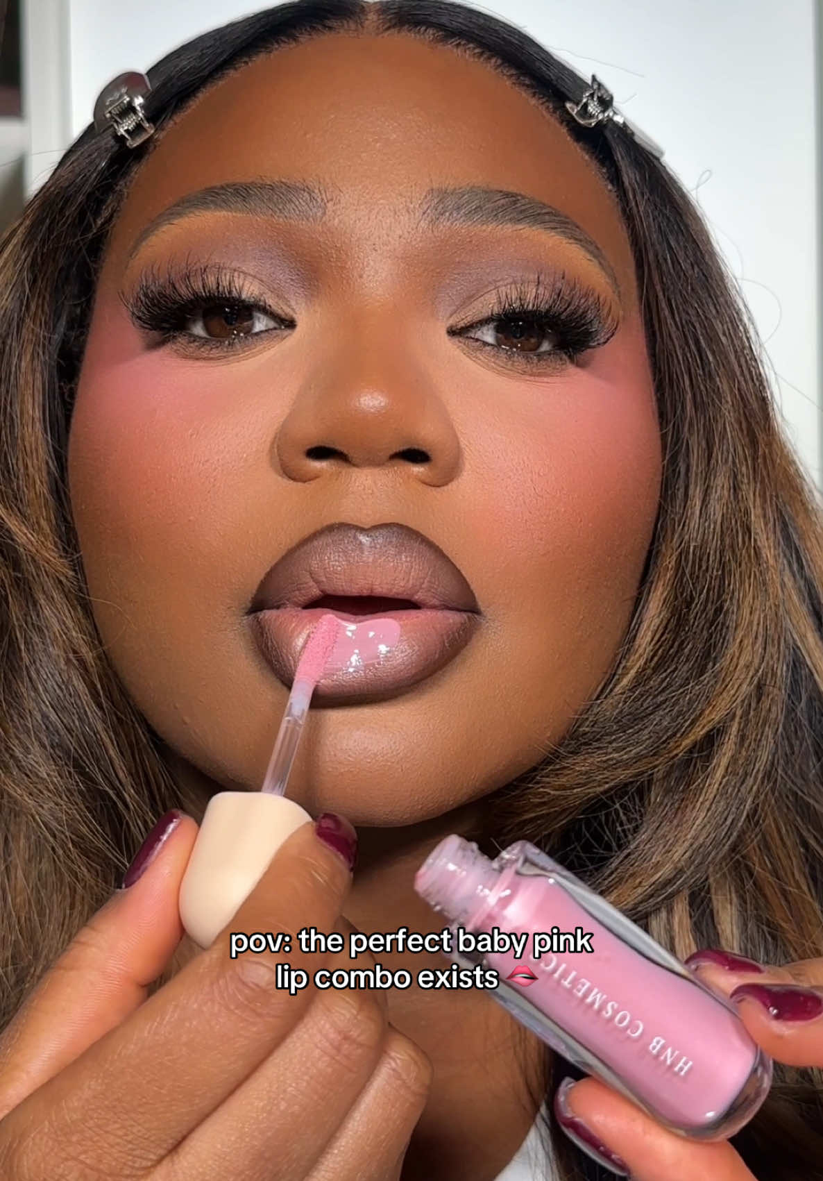 TikTok post by @makeupbymissevelyn for HNB Cosmetics. Caption reads: this lip combo 😮‍💨🫦 @HNB Cosmetics lip pencil....