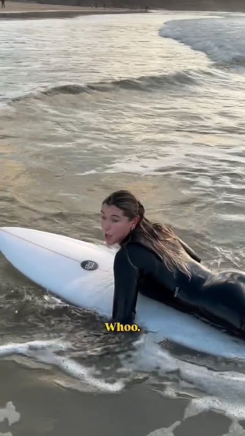 Instagram post by @skylaar.gracee for dryrobe. Caption reads: Water is getting colder, conditions are sometimes....