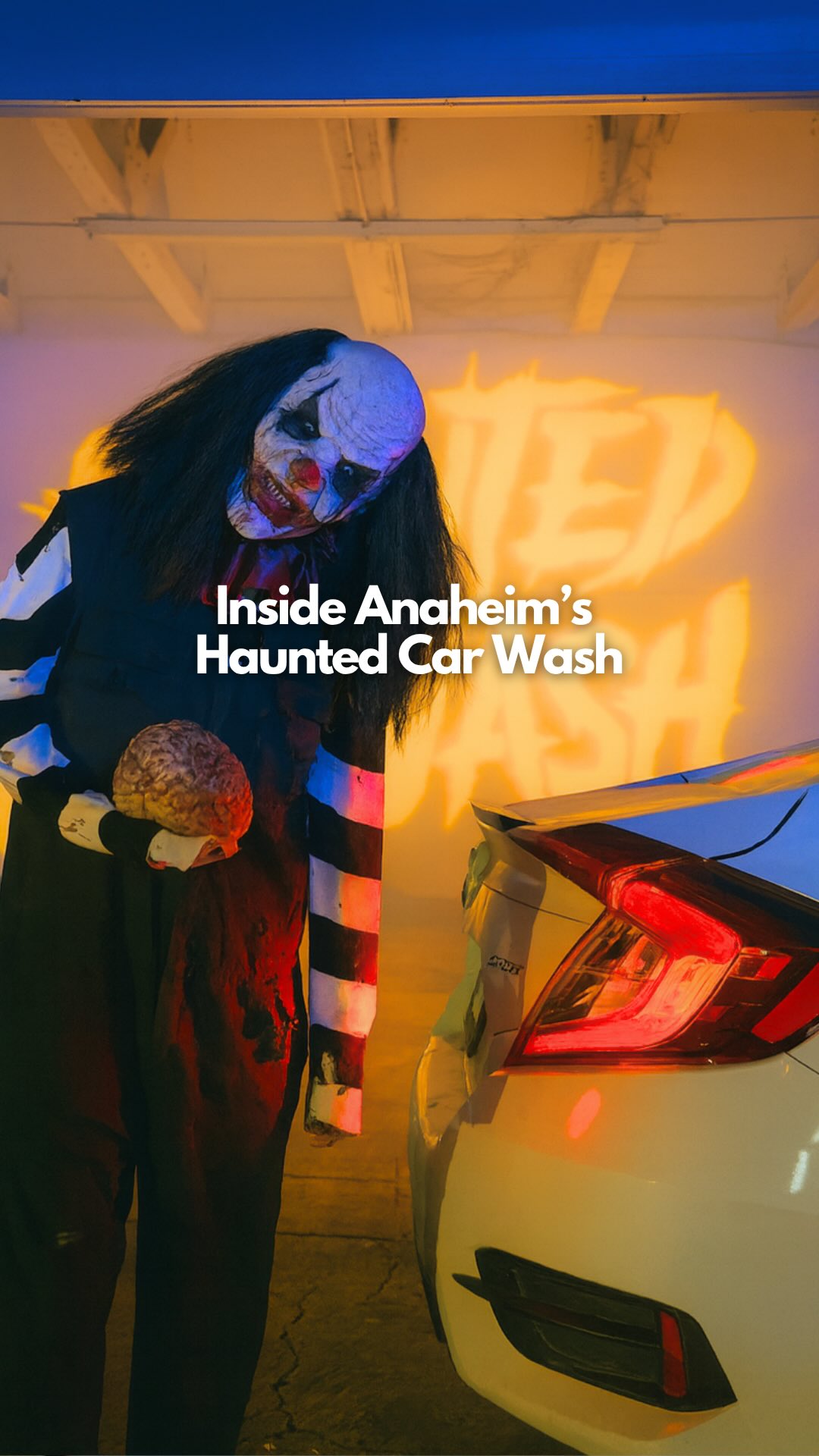 Instagram post by @hauntedcarwashoc for Visit Anaheim. Caption reads: At @hauntedcarwashoc, the soap’s real but so are....