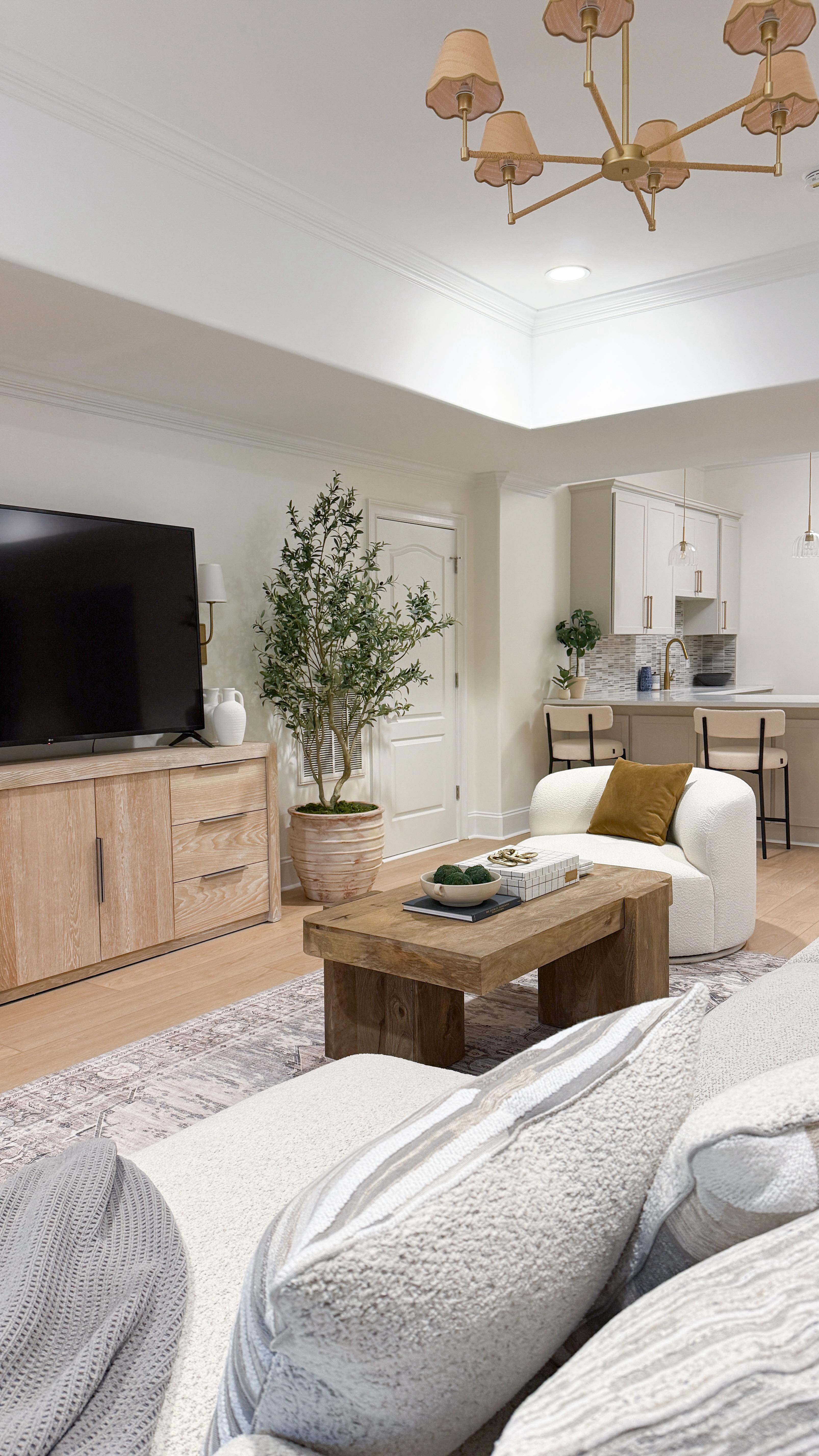 Instagram post by @wild.hearts.home for Rooms To Go. Caption reads: This feels like a brand new space! I honestly....