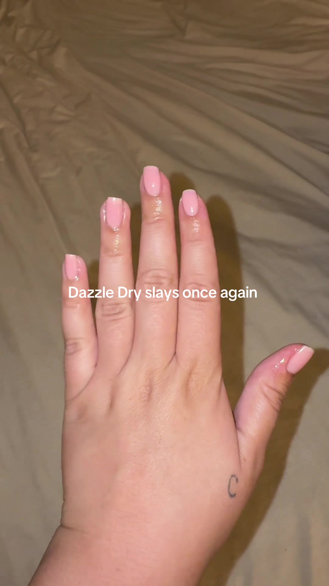 TikTok post by @taylaraela for Dazzle Dry. Caption reads: @Dazzle Dry slays once again! This color is shade....