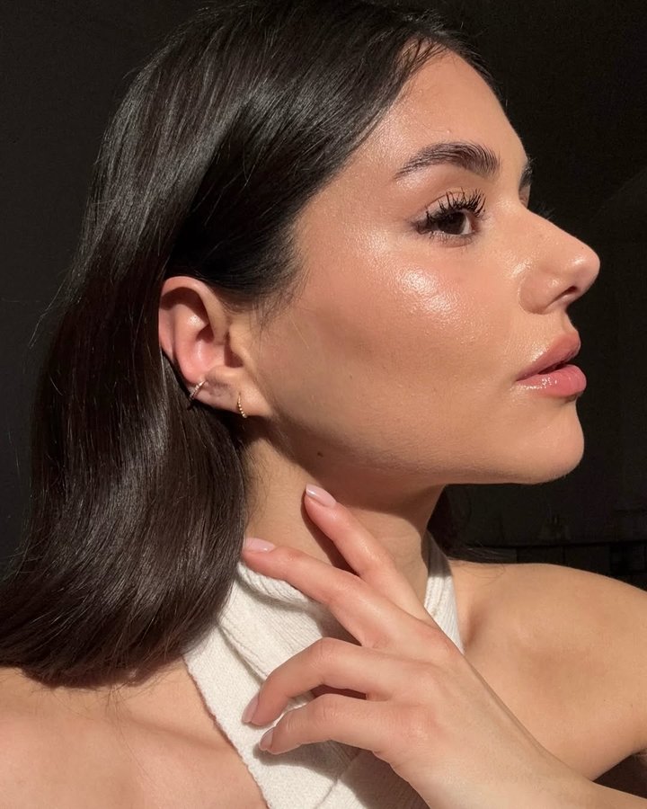 Instagram post by @aaylingk for AKIND. Caption reads: [...] hoops & beaded ear cuff from  @wearakind -....