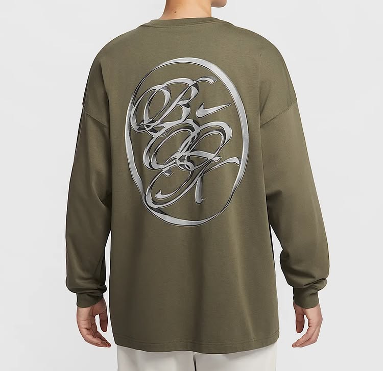 Instagram post by an influencer for Nike. Caption reads: @dbook Nike Long-Sleeve Basketball T-Shirt [...].