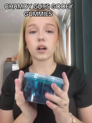 TikTok post by @elle_success for ChamoyGuysUK. Caption reads: [...] #xyzabc #fyp #blowup #viral #foodtok....