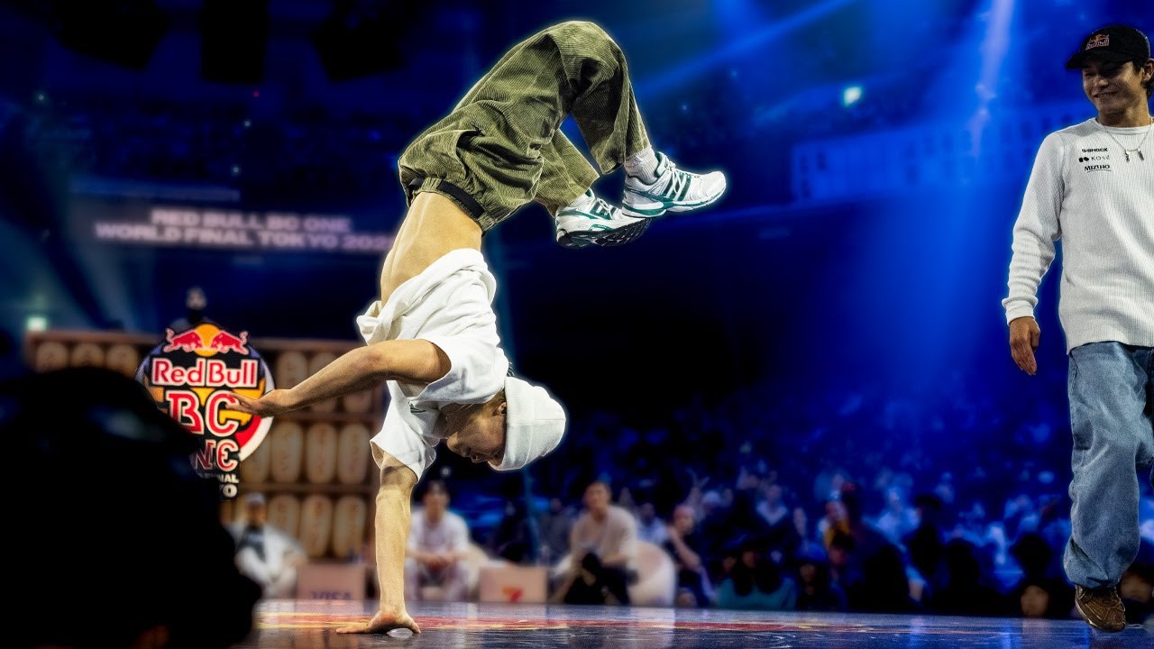 YouTube post by @RedBullBCOne for Reebok. Caption reads: [...] Tokyo 2025 here: In collaboration with....