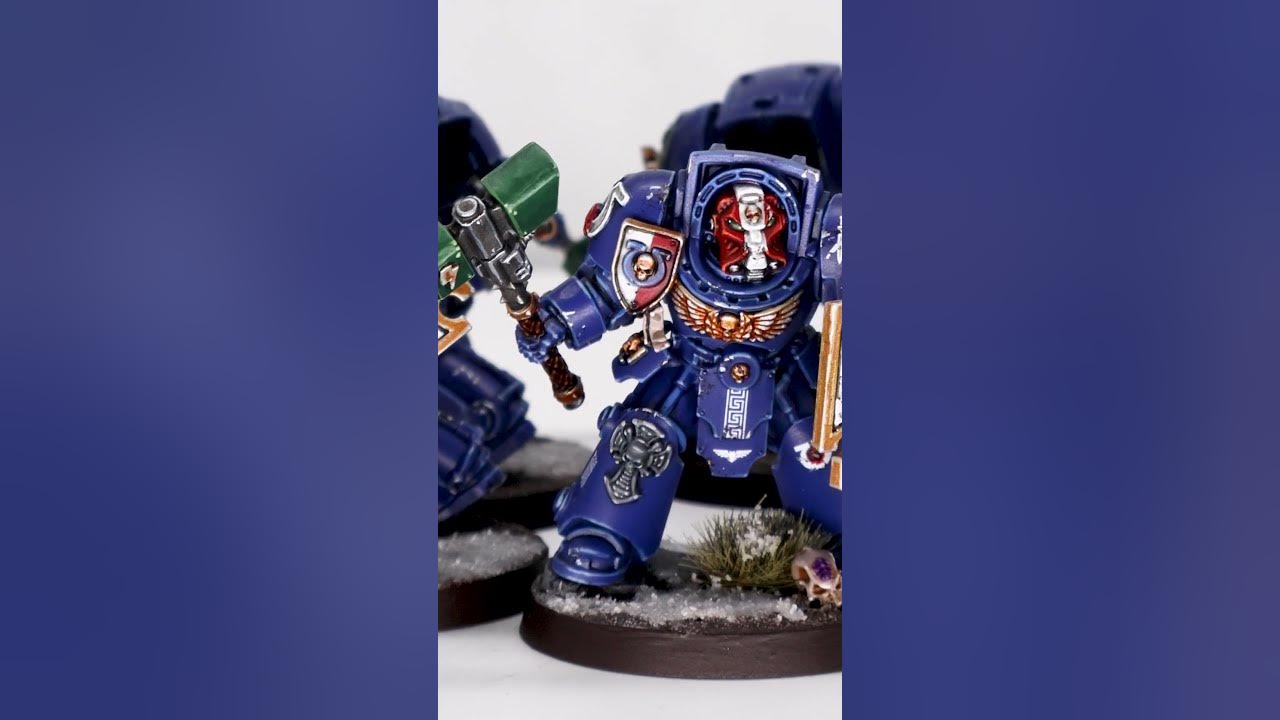 YouTube post by @GoonhammerTV for The Army Painter. Caption reads: [...] Read more at Check out our sponsor, The Army....