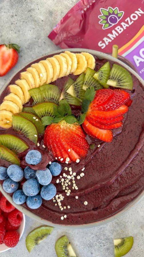 Instagram post by @littlekalegirl for SAMBAZON. Caption reads: [...] a Coffee Açaí Smoothie Bowl featuring....