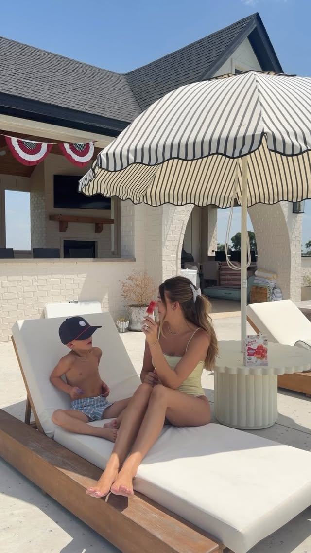 Instagram post by @hannnnahadams for JonnyPops. Caption reads: Pool days are even sweeter with @jonnypops ☀️💙 We....