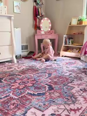 TikTok post by @thatonemomkadie for HULOOSLEEP. Caption reads: The best mom hack? Buy these memory foam playmats....