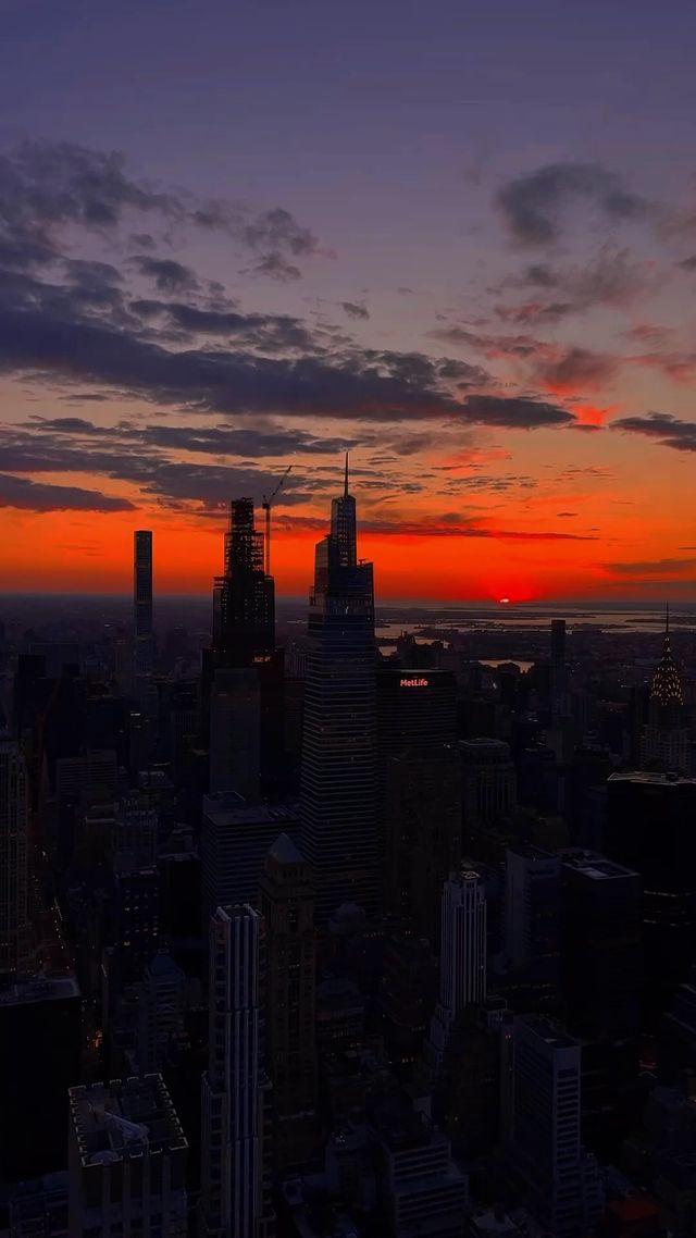Instagram post by @oshawaiters for B&H Photo Video. Caption reads: nyc sunrise views from the @empirestatebldg 🌇....