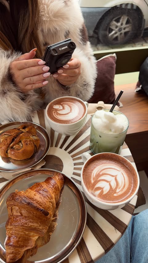 Instagram post by @saffiekhan_ for Carolina Herrera. Caption reads: a herrera christmas🎁✨💋
@carolinaherrera ad....