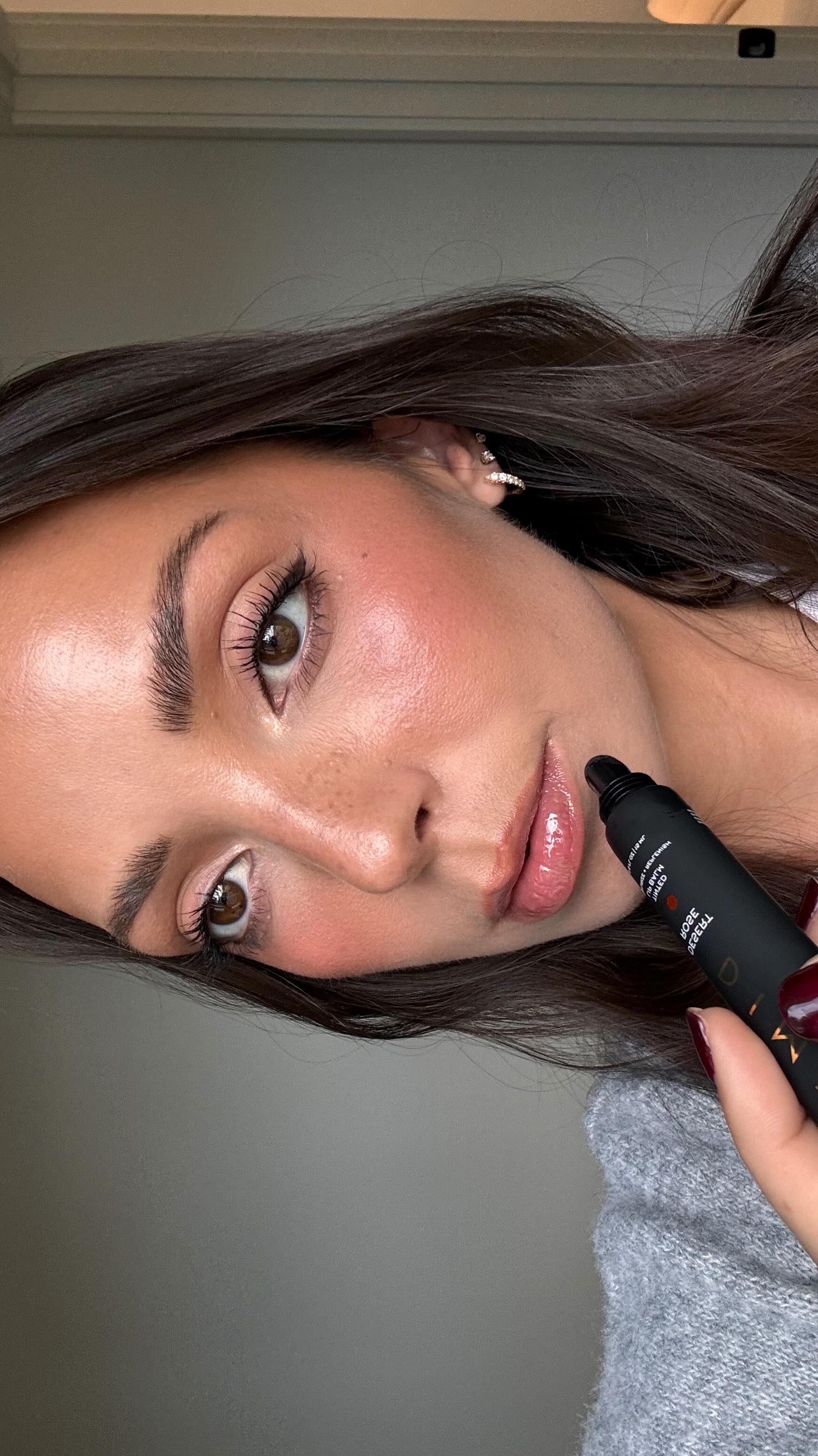 Instagram post by @whitneykshepherd for DIME Beauty. Caption reads: [...] 🤭 these lip balms from @dimebeautyco are....