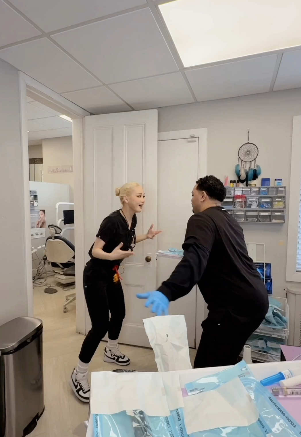 TikTok post by @sarangdmd for Mediclo. Caption reads: 👉🏻👈🏻@Sebastian  My scrubs are from mediclo.com....