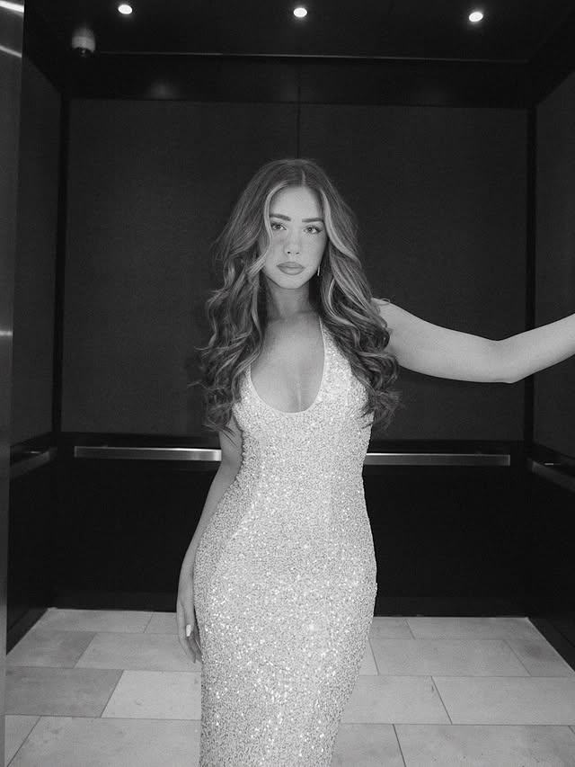 Instagram post by an influencer for Lulus. Caption reads: [...] to go in this dress💭✨👡🥂 @lulus....