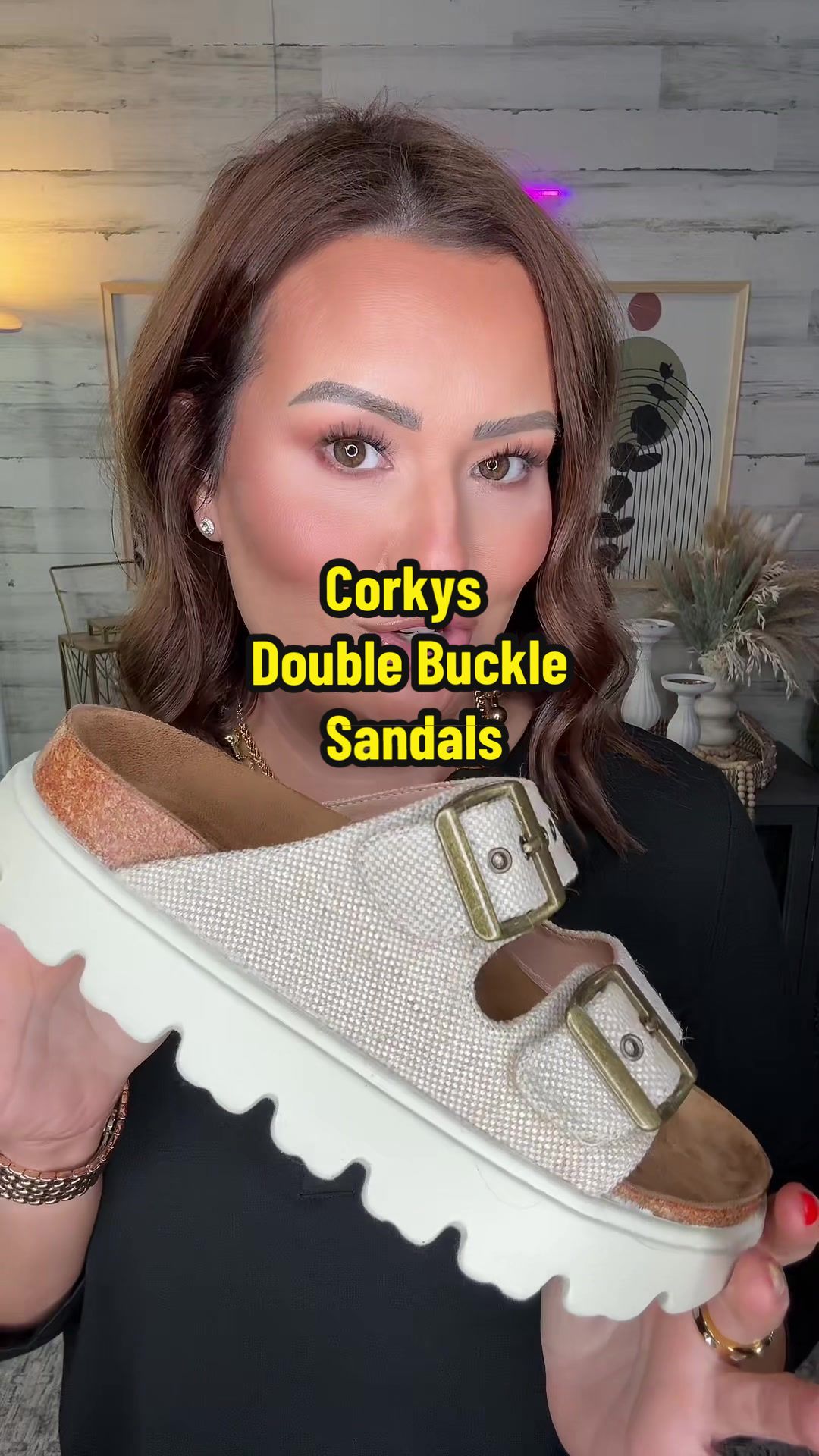 TikTok post by @katrinagmoore for Emma Lous Boutique. Caption reads: A double buckle sandal from Corky’s??  Say....