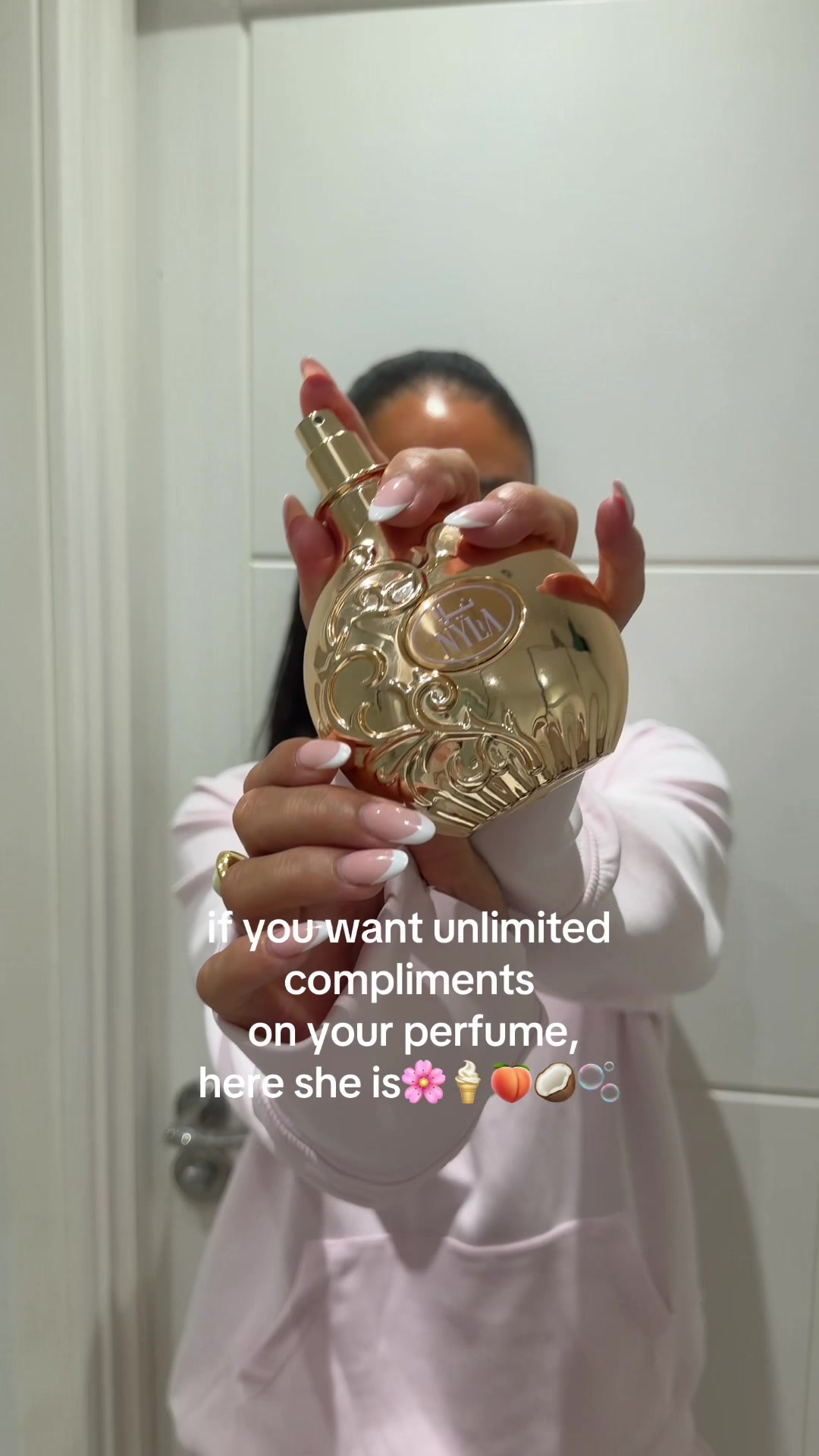 TikTok post by @tyrabaylis for Salsabeel Perfumes. Caption reads: The coconut, peach, floral, vanilla notes is the....