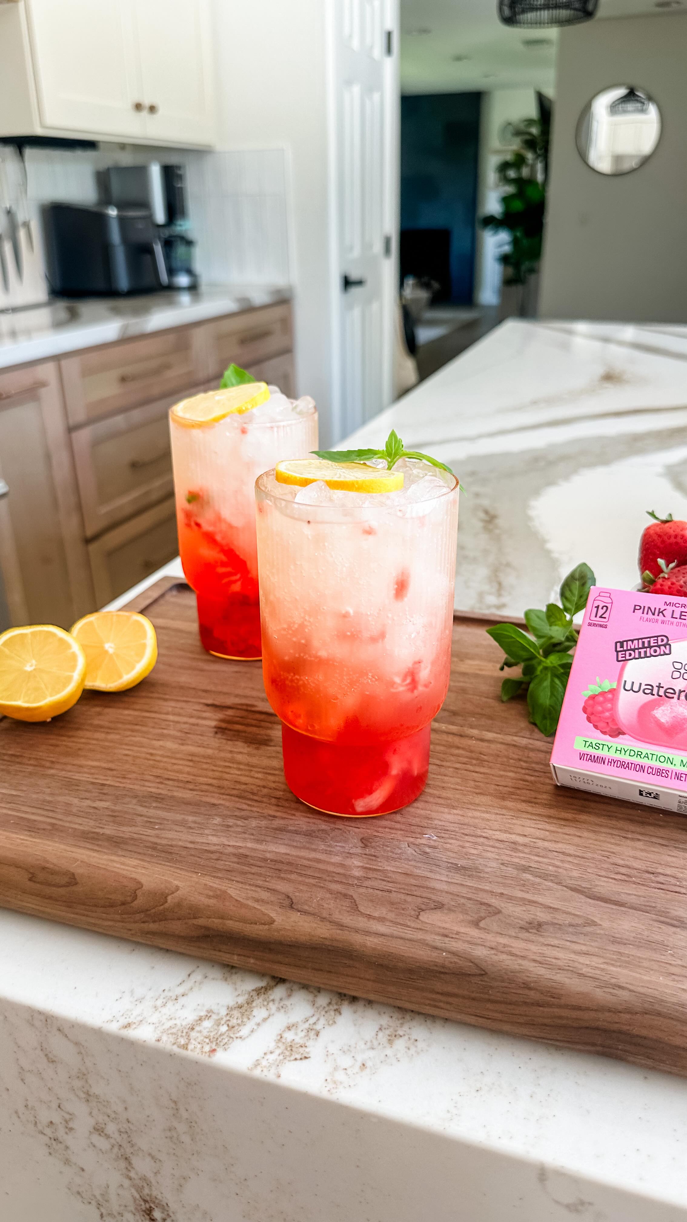 Instagram post by @lovelydelites for Waterdrop. Caption reads: STRAWBERRY PINK LEMONADE MOCKTAIL 💕🍓 //

This....